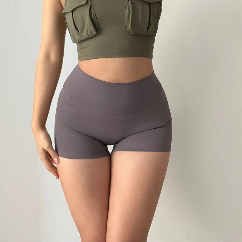 Hip lifting fitness yoga shorts, three-quarter pants, female high-waisted peach nude running sports shorts, quick-drying, GymHUB