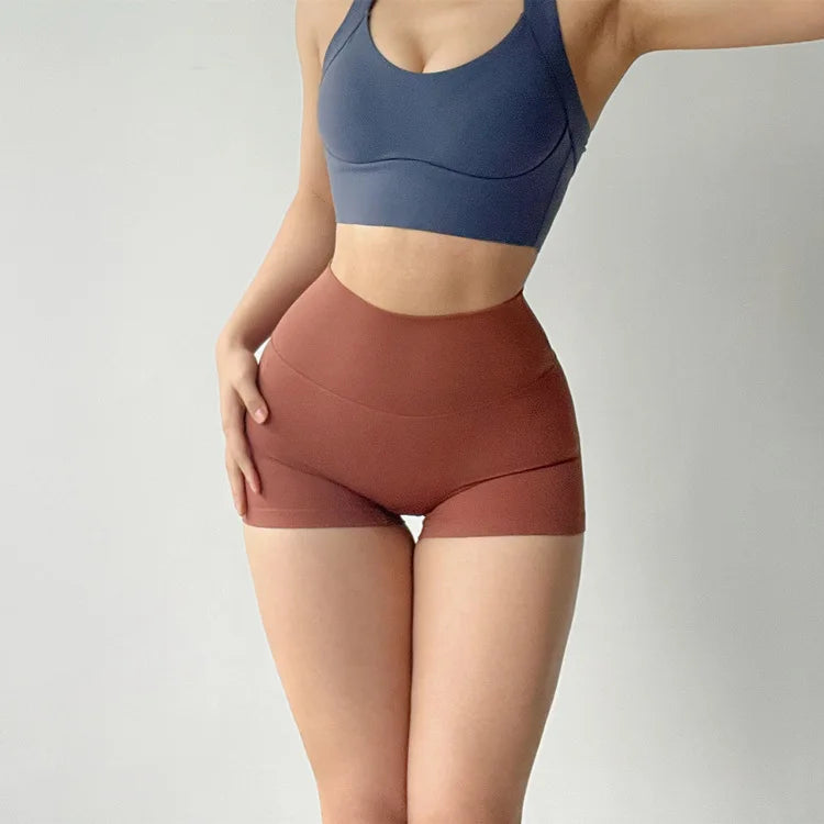 Hip lifting fitness yoga shorts, three-quarter pants, female high-waisted peach nude running sports shorts, quick-drying, GymHUB
