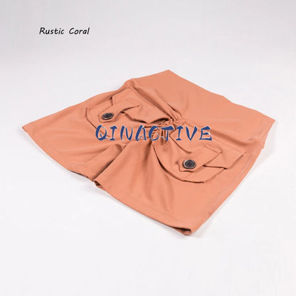 Pantalones Cortos de Yoga QINACTIVE para Mujer con Bolsillos, Fruncidos en los Glúteos, Mallas de Gimnasio de Cintura Alta con Efecto Push Up, Pantalones Cortos Deportivos Sexy para Glúteos, Fitness