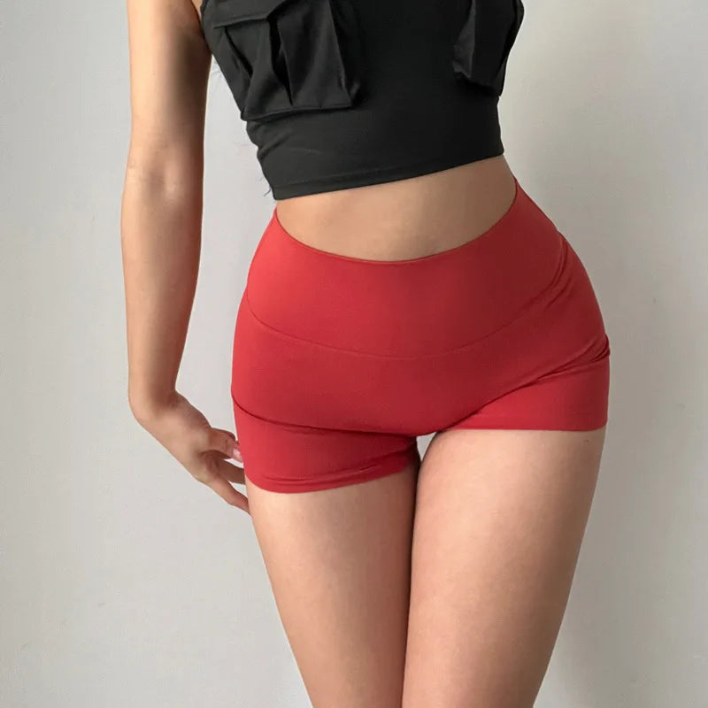 Hip lifting fitness yoga shorts, three-quarter pants, female high-waisted peach nude running sports shorts, quick-drying, GymHUB